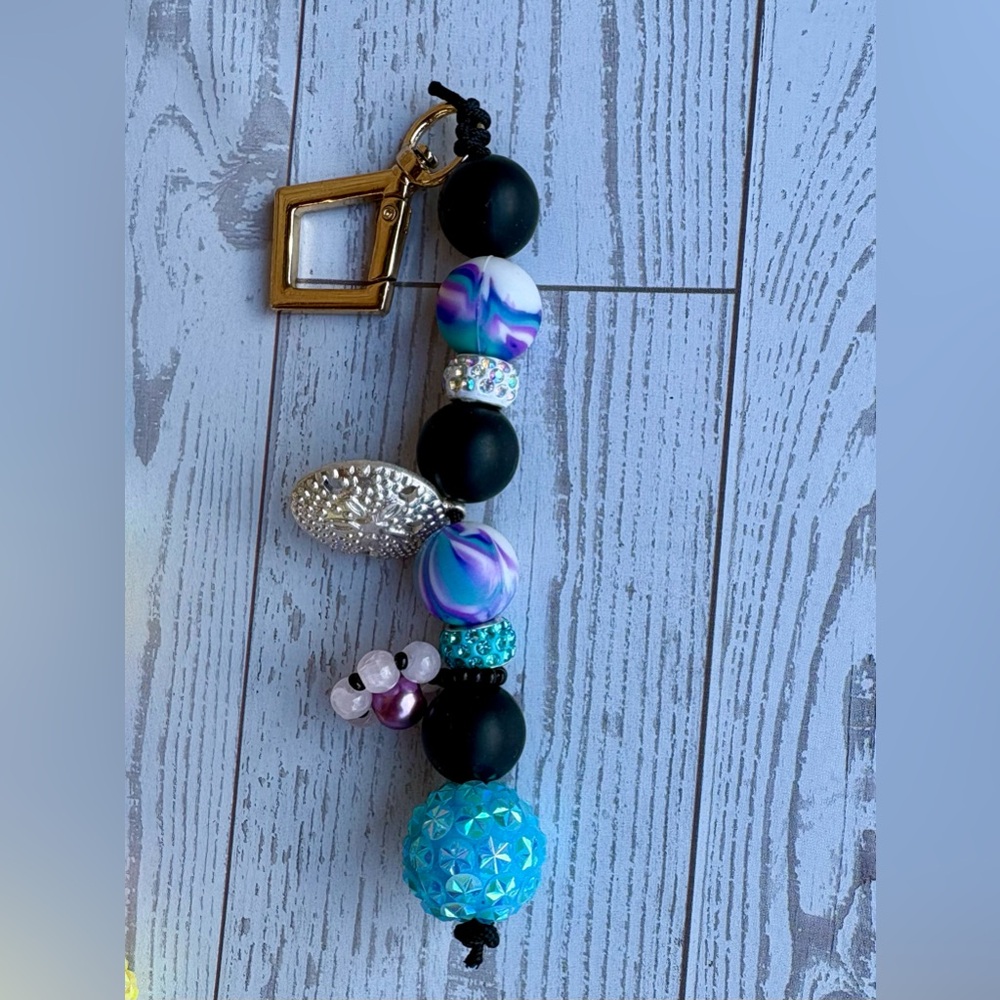 Beaded sand dollar bag charm